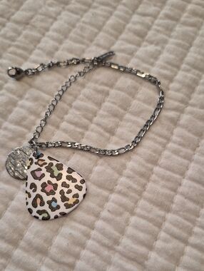 Stainless Steel Bracelet with A Cheetah Print Guitar Pick And Hammered Charm